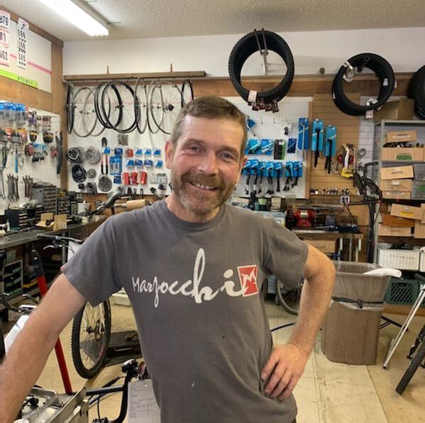 picture of a man in a bike store